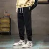 Pantalones casuales de pana para otoño para hombre, nuevos pantalones jogger de chenille patchwork de corte holgado, pantalones deportivos de marca de moda