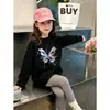 Camiseta de manga larga de algodón puro para niñas, nuevo estilo primavera y otoño, top casual holgado para niños mayores, elegante camiseta básica de cuello redondo para niñas