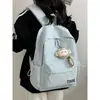 Mochila de moda de color liso con estampado de letras, simple y versátil, estilo japonés, adecuada para estudiantes de secundaria, preparatoria y universidad