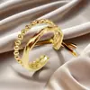Anillo de Acero de Titanio Color Sin Desgaste Transfronterizo Moda Estilo Lujo Ligero Apertura Ajustable Diseño de Nicho Anillo Chapado en Oro para Mujeres