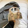 Bolso de Lujo de Gama Alta de Nicho para Mujer Moda Nueva Primavera/Verano Bolso de Mano Versátil Bolso Cruzado Bolso de Hombro Texturizado