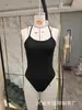 Suministro exclusivo de comercio electrónico transfronterizo desde fábrica, al por mayor directo en stock: Mono deportivo casual para mujer, color liso, sin espalda, estilo racing, protector solar
