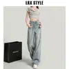 Jeans Wide Leg Desfiado de Cor Clara para Mulheres Verão 2025 Novo Design Calças Retas Soltas de Cintura Alta Lavadas