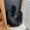 Bolsa de tela para clase de comercio exterior transfronterizo, Bolso cruzado de nailon, Bolso de hombro estilo japonés de gran capacidad tipo albóndiga, Macarrón