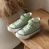 Zapatos deportivos casuales versátiles para niños, nuevo estilo otoño 2025, zapatillas de lona antideslizantes de moda para niños y niñas.