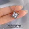 Collar transfronterizo europeo y americano de plata de ley 925 con colgante de trébol de cuatro hojas de moissanita, collar versátil de moissanita de 1 quilate para mujeres al por mayor