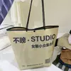 Sacola de loja de roupas personalizada tamanho grande presente publicitário têxteis para casa compras roupas femininas roupas infantis sapatos saco de embalagem com cordão