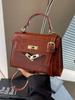 Bolso Retro Texturizado 2024 Nuevo Bolso de Mujer Moderno Moderno de Hombro Bajo el Brazo Bolso Cuadrado Pequeño Estilo Occidental Simple Bolso Bandolera