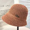 Corea del Sur Nuevo Sombrero de Paja Sombrero de Pescador para Mujer Verano Tejido Transpirable Protección Solar Sombrilla Facial Sombrero Cubo Pequeño Todo Fósforo Sombrero Cubo