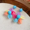 Aretes florales transparentes estilo hada para primavera y verano, aretes colgantes de margarita estilo bosque delicado de nicho, aretes versátiles estilo vacacional con corazón de chica