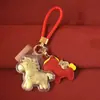 Chaveiro Pingente de Cavalo de Couro Colorido Corrente de Celular Cavalo de Desenho Animado Presente de Ano Novo Venda por Atacado em Grandes Quantidades