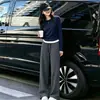 Conjunto Esportivo Casual para Corrida Outono/Inverno Novo para Mulheres Top de Gola Redonda Falso Duas Peças Calças de Perna Larga Listradas Emagrecedoras Tendência