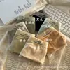 Calcinhas Fofas Sem Costura com Letras Cintura Média Frescas Alta Elasticidade Macias Sexy Tricô Sem Costura Calcinhas Triângulo para Meninas