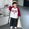 Conjunto de Sudadera a Cuadros para Niños Otoño 2026 Nuevo Moda Pantalones a Cuadros Infantiles Conjunto de Dos Piezas Ropa de Moda para Bebé Primavera y Otoño