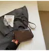 Bolso Pequeño Cuadrado Retro Chic para Mujer 2026 Modelo Nuevo Bolso de Mano Bolso Cruzado con un Toque de Lujo Bolso de Hombro Versátil Bolso de Moda para el Trabajo