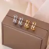 Pendientes Cruzados Chapados en Oro de 18 Quilates para Mujer, Pendientes de Diseño Exclusivo, Nuevo Estilo Caliente 2025, Pendientes de Lujo Ligero y Gama Alta