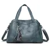 Bolsa de mujer más vendida 2026, bolso de mano simple, moderno y versátil, cuero suave, gran capacidad, bolso de hombro y cruzado, disponible para venta al por mayor