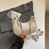 Bolso de moda tipo medialuna estilo coreano para mujer, nuevo bolso de mano casual de nicho primavera 2026, bolso de hombro de moda, bolso de axila para damas