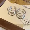 Pendientes de plata 2024 nuevo modelo popular, elegantes pendientes de aro en forma de C de múltiples capas, lujo ligero con un toque de alta gama, accesorios únicos para la oreja