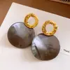 Pendientes redondos de tachuela estilo retro con aguja plateada, pendientes de moda exagerados exquisitos, pendientes de lujo ligero de alta gama, accesorios para pendientes, sentido del diseño, nicho