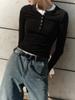 Camiseta de manga larga con cuello redondo, estilo europeo y americano, estilo casual, combinable, de invierno 2025, de color liso, con bordes cruzados, para mujer