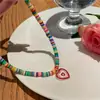 2023 Nova Cor Pingente de Coração Design Nicho Colar de Cor Contrastante Feminino Doce Cool Corrente de Clavícula com Contas Atacado