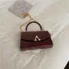 2026 Gran Capacidad Casual Color Sólido Primavera/Verano Nuevo Diseño Personalizado Moda Tendencia Cadena Bolso de Mano Bolso Cruzado Pequeño Cuadrado