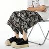 Verão 2025 Novo Cruzamento Masculino Estilo Chinês Casual Calça de Praia Retro Tamanho Grande Moda Estampada Calça Capri Masculina