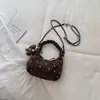 Bolso plisado muy elegante y atractivo, nueva moda otoño 2026, adecuado para el trabajo y los desplazamientos, bolso tote pequeño cruzado con cadena