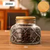 Pote Selado com Relevo Vintage Garrafa de Barriga Grande Pote Redondo Doméstico para Armazenamento Embalagem de Grãos Garrafa de Vidro Transparente Garrafa Vazia Venda por Atacado