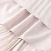 Falda plisada fluida de alta gama estilo francés para mujer, nuevo modelo de verano 2026, elegante y estilizada, falda midi versátil casual