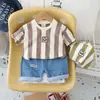 2024 Nuevo Verano Niños Cuello Redondo Letra Vertical Manga Corta Mezclilla Algodón Pantalón de Cinco Cuartos Conjunto de Dos Piezas Fabricante Venta al por Mayor