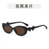 Gafas de sol con montura pequeña estilo ojo de gato y lazo Estilo retro europeo y americano Gafas de sol de personalidad Ins Gafas simples transfronterizas Moda para mujer