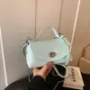 Bolsa Tote Pequena Super Moderna para o Dia a Dia Feminina 2026 Nova Moda Primavera Popular Bolsa de Ombro Único Toque de Luxo Bolsa Quadrada Pequena Transversal
