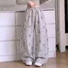 Pantalones anchos con estampado de dibujos animados nuevos para niñas 2026, pantalones deportivos casuales holgados estilo coreano, pantalones de chándal con cintura elástica para niños mayores