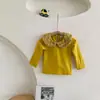 Ropa Infantil Coreana Colección Primavera 2026 Camiseta para Niñas con Solapa de Muñeca de Flores Manga Larga Dulce