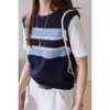 Conjunto de verano estilo coreano: Camiseta de manga corta de dos piezas falsas a rayas de albaricoque para mujer, top holgado super popular 2026 que reduce la edad