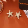 Brincos de Zircônia Estrela Cruzados da Amazon Estilo Europeu e Americano Modernos de Alta Qualidade Exquisitos Atmosféricos Tridimensionais Estrelas de Cinco Pontas