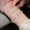¡Las mariposas bailan! Pulsera de flor de circón chapada en oro real, pulsera de atmósfera primaveral, joyería de diseño nicho para mujer