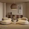 Juego de sofá tipo guijarro para sala de estar de apartamento pequeño estilo crema, sofá de negociación moderno creativo simple y único