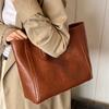Bolsa feminina grande capacidade textura estilo Hong Kong 2025 nova outono e inverno simples para o dia a dia feminina tote ombro bolsa de mão