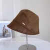 Sombrero de pescador decorativo de moda con logo pequeño estilo coreano para mujer, nuevo sombrero tipo cubo casual versátil de otoño, elegante sombrero cloche de moda