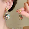 Pendientes de perla asimétricos estilo europeo y americano, pendientes de moda de nicho de alta gama, pendientes llamativos únicos y versátiles