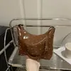 Bolso Cubo Casual Retro de Nicho Personalizado 2025 Moda Otoño Nuevo Bolso de Hombro Cruzado para Mujer