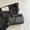 2026 Invierno Nueva Moda de Gran Capacidad Tendencia Diseño de Nicho Versátil Casual Simple Texturizado Bolso de Hombro