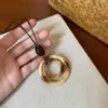Nuevo Collar Colgante de Resina Estilo Étnico Chino Marrón Retro para Mujer Lanyard Cadena de Clavícula Accesorios Nuevo Estilo 2026