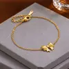 Princesa Fugitiva Lindo Lazo Conjunto de Joyería Estilo Estudiante Aretes de Cinta Acero de Titanio Chapado en Color Oro de 18K Conservación del Color