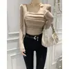 Roupas Femininas de Celebridade da Internet Coreia Dongdaemun 2025 Novo Conjunto de Duas Peças Moda com Regata Justa Sexy de Gola Quadrada + Cardigã
