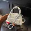 Bolsa Pequena Super Popular para Mulheres Primavera 2026 Laço Gatinho Kt Bolsa Torrada Prata Versátil Moda Ombro Transversal
