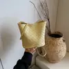 Bolso cubo de moda transfronterizo para mujer, nuevo modelo primavera 2026, bolso de hombro de nicho de alta gama, bolso cruzado versátil
